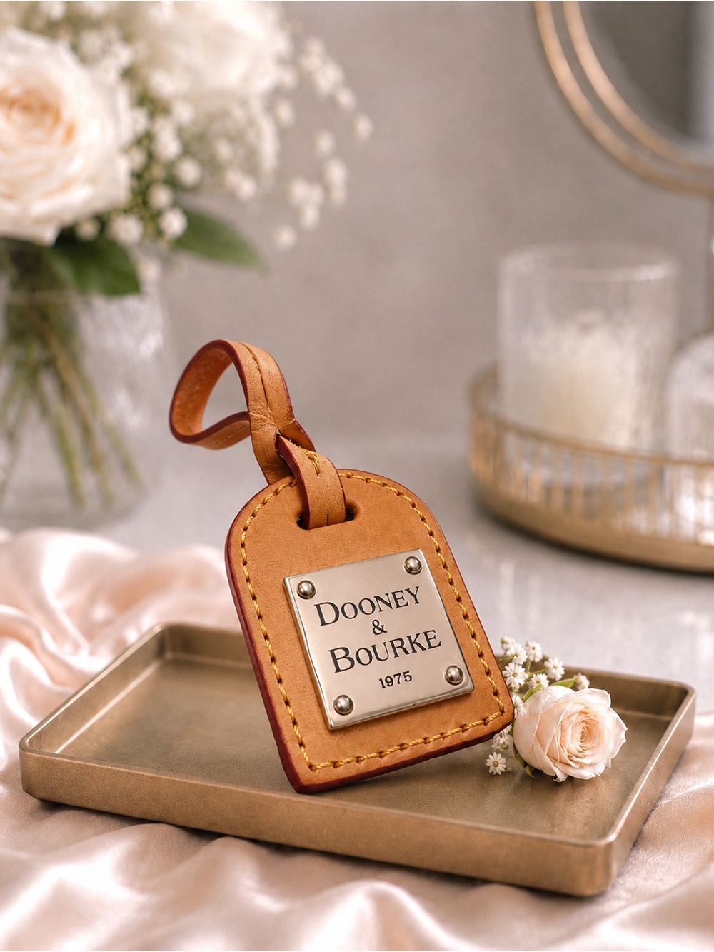 Dooney & Bourke Tan Leather luggage  Tag with Gold Accents